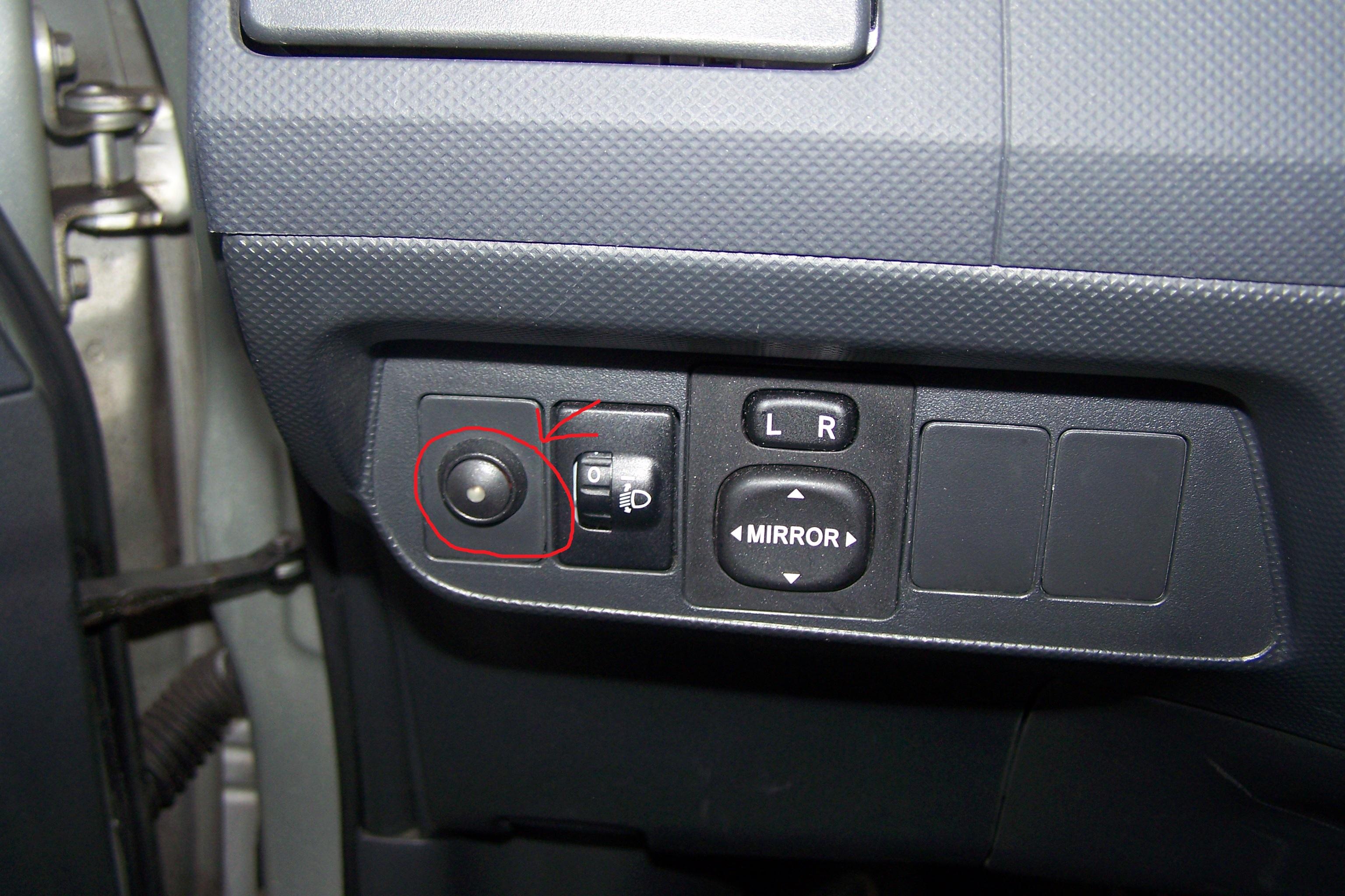 what does the button do ? Auris Club Toyota Owners