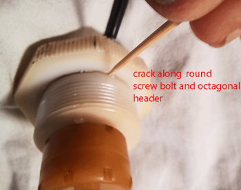 11 Crack identified between octagonal header and round screw body.png